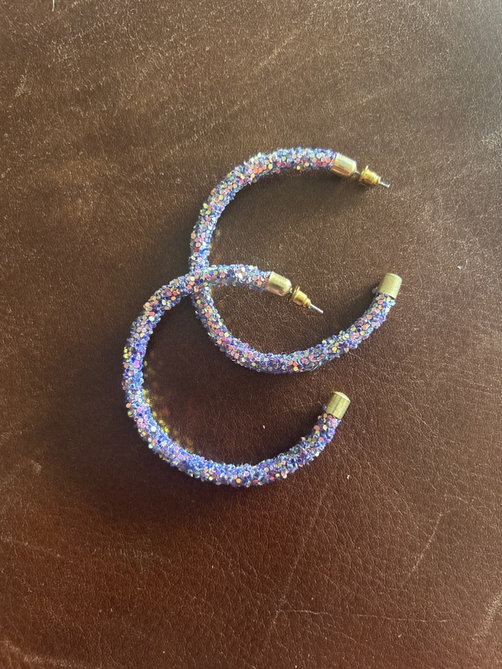 Purple sparkly earrings